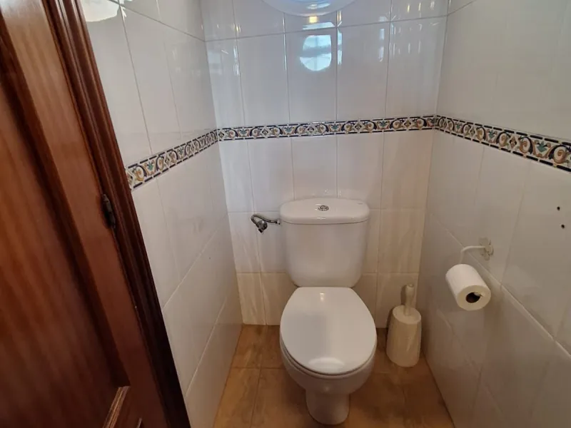 Discover unparalleled coastal serenity in this magnificent semi-detached townhouse within the prestigious Sierramar III urbanisation, a secure gated enclave in Marbella's exclusive Huerta del Prado-La Montúa district, nestled against the foothills of the 