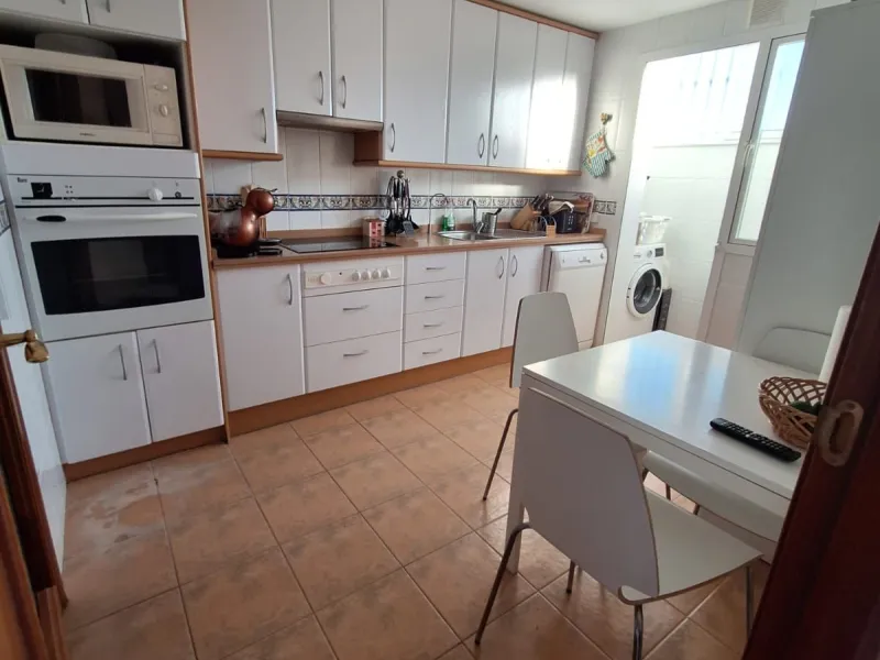Discover unparalleled coastal serenity in this magnificent semi-detached townhouse within the prestigious Sierramar III urbanisation, a secure gated enclave in Marbella's exclusive Huerta del Prado-La Montúa district, nestled against the foothills of the 