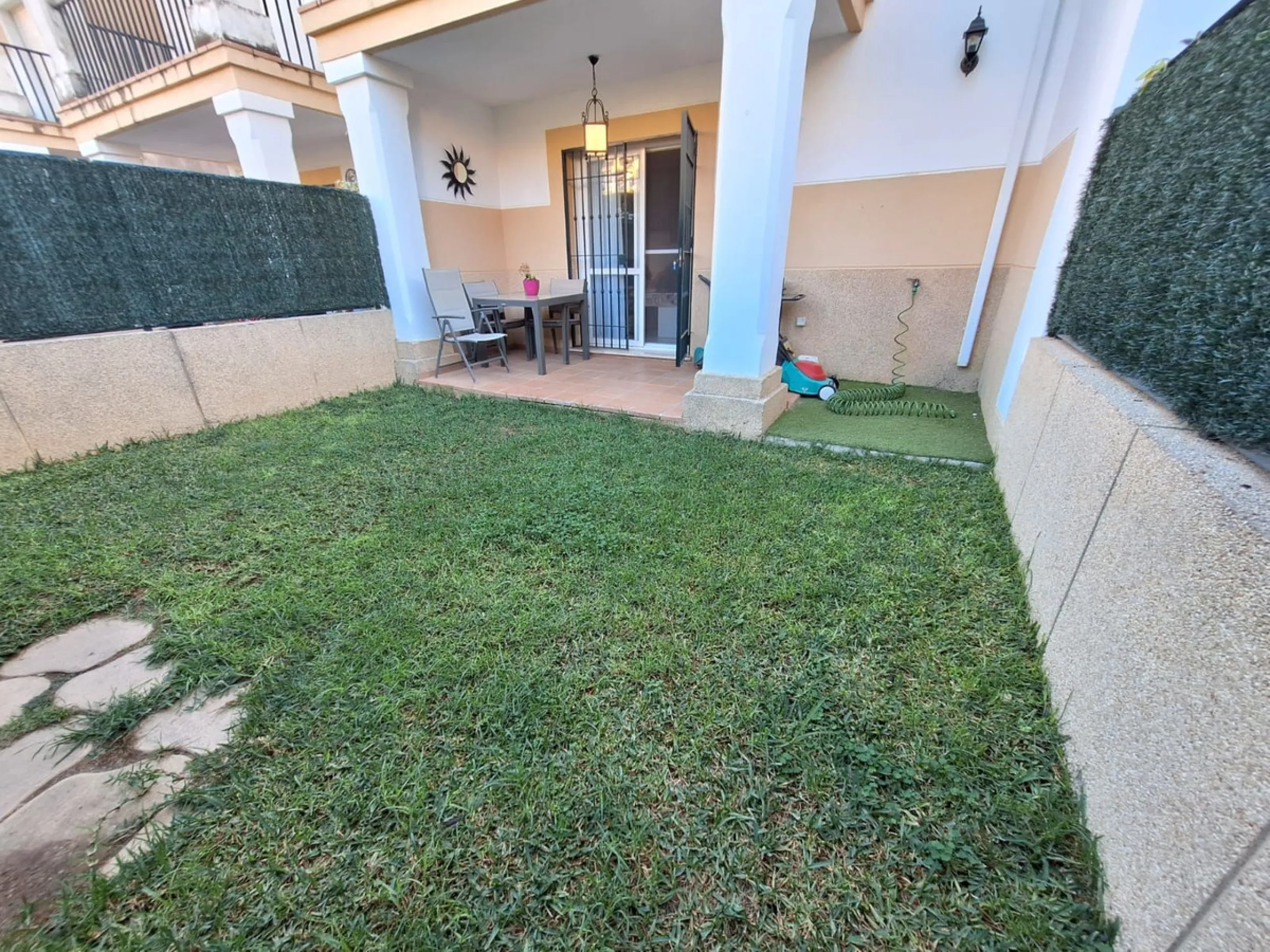 Discover unparalleled coastal serenity in this magnificent semi-detached townhouse within the prestigious Sierramar III urbanisation, a secure gated enclave in Marbella's exclusive Huerta del Prado-La Montúa district, nestled against the foothills of the 