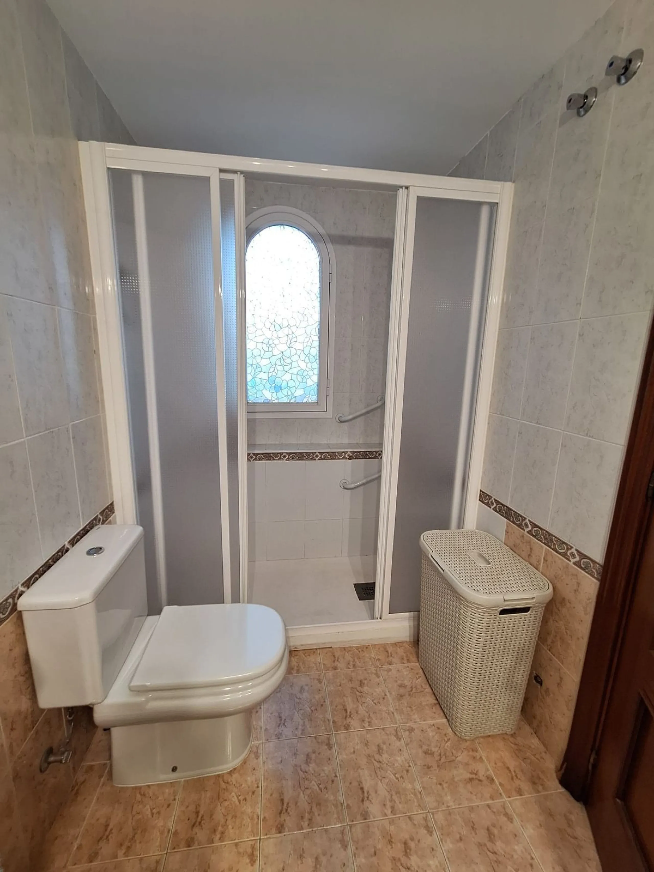 Discover unparalleled coastal serenity in this magnificent semi-detached townhouse within the prestigious Sierramar III urbanisation, a secure gated enclave in Marbella's exclusive Huerta del Prado-La Montúa district, nestled against the foothills of the 