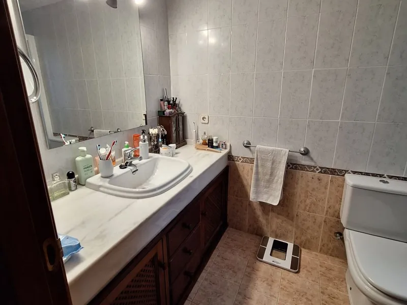 Discover unparalleled coastal serenity in this magnificent semi-detached townhouse within the prestigious Sierramar III urbanisation, a secure gated enclave in Marbella's exclusive Huerta del Prado-La Montúa district, nestled against the foothills of the 