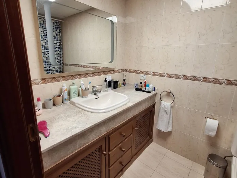Discover unparalleled coastal serenity in this magnificent semi-detached townhouse within the prestigious Sierramar III urbanisation, a secure gated enclave in Marbella's exclusive Huerta del Prado-La Montúa district, nestled against the foothills of the 