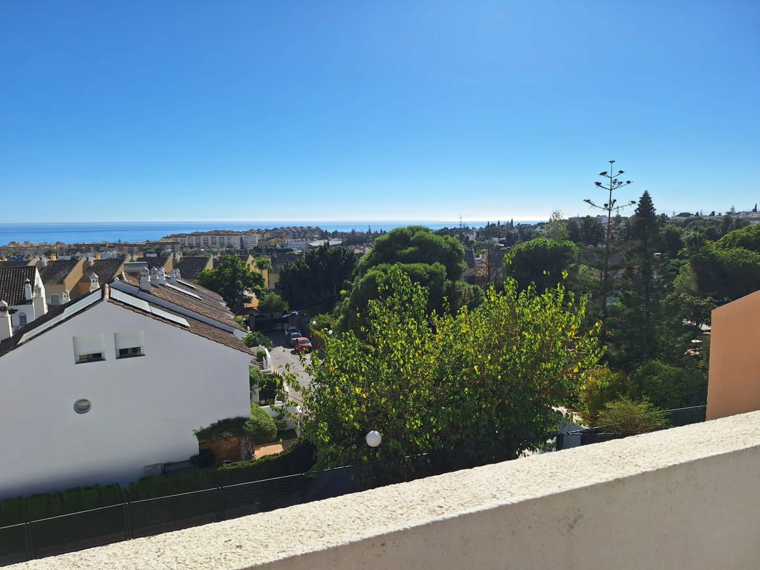 Discover unparalleled coastal serenity in this magnificent semi-detached townhouse within the prestigious Sierramar III urbanisation, a secure gated enclave in Marbella's exclusive Huerta del Prado-La Montúa district, nestled against the foothills of the 