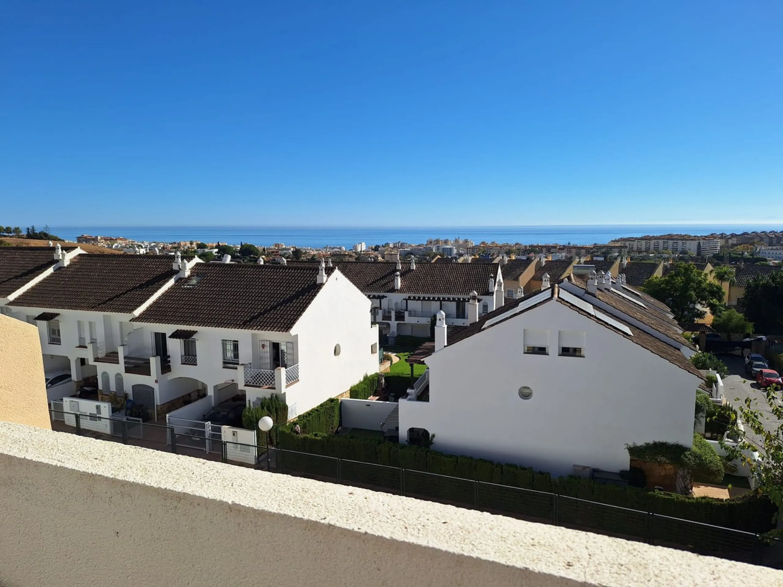 Discover unparalleled coastal serenity in this magnificent semi-detached townhouse within the prestigious Sierramar III urbanisation, a secure gated enclave in Marbella's exclusive Huerta del Prado-La Montúa district, nestled against the foothills of the 