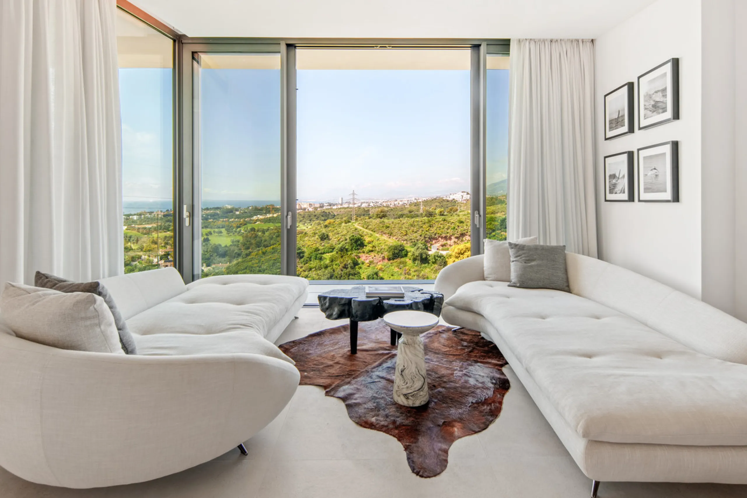 Set on a south-facing plot of over 1,000 m², this newly built villa delivers sweeping views of the Mediterranean Sea and surrounding mountains. Developed by Sands Villas and designed by Gonzalez Jacobson, the property combines sharp modern architecture wi