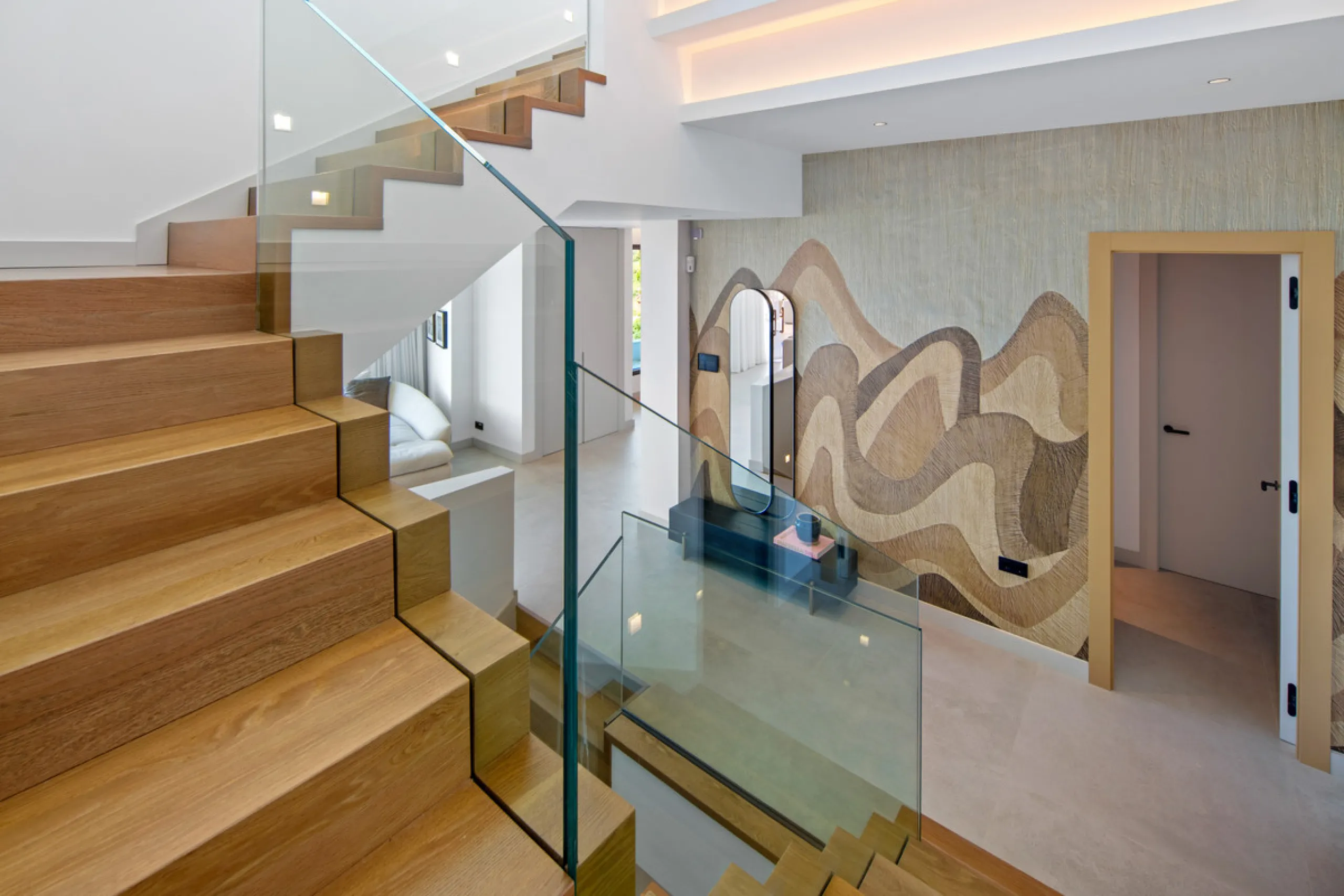 Set on a south-facing plot of over 1,000 m², this newly built villa delivers sweeping views of the Mediterranean Sea and surrounding mountains. Developed by Sands Villas and designed by Gonzalez Jacobson, the property combines sharp modern architecture wi