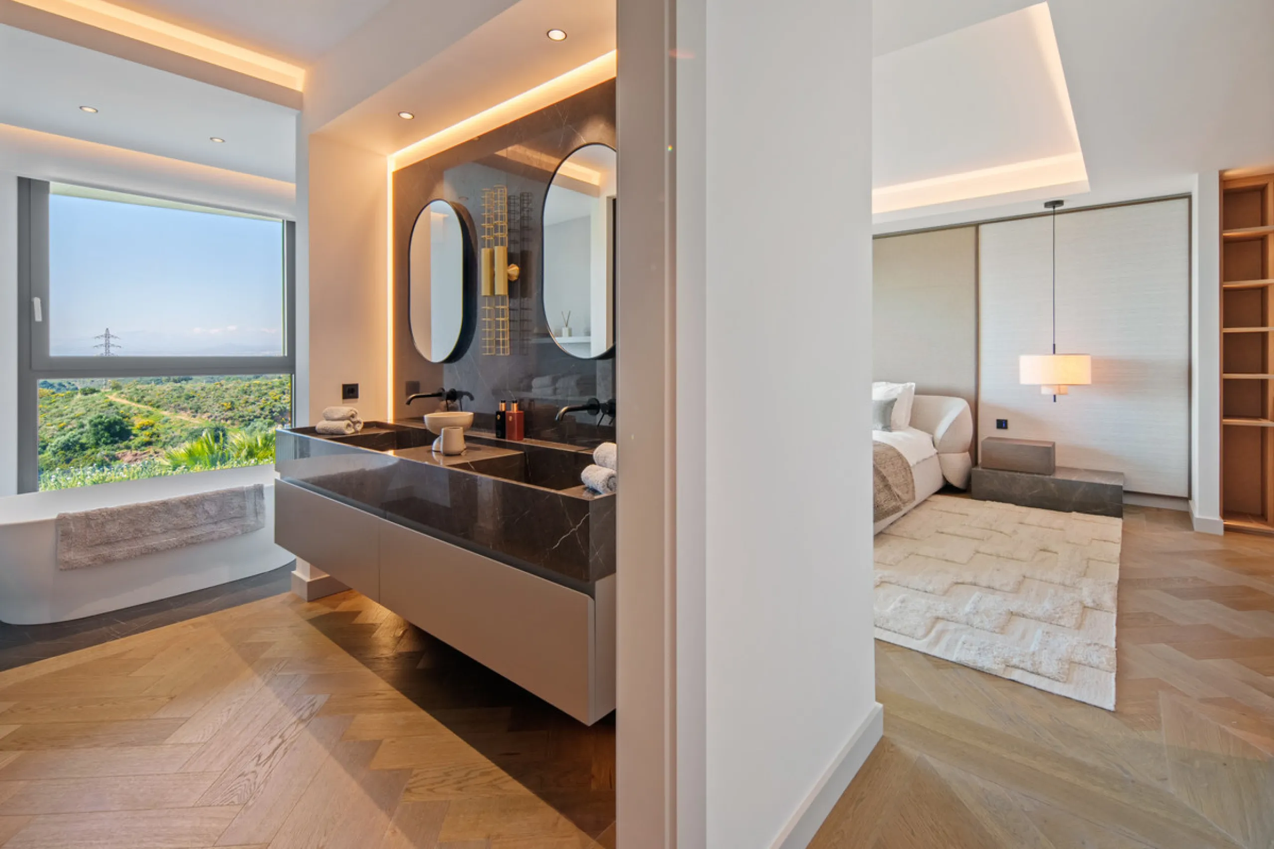 Set on a south-facing plot of over 1,000 m², this newly built villa delivers sweeping views of the Mediterranean Sea and surrounding mountains. Developed by Sands Villas and designed by Gonzalez Jacobson, the property combines sharp modern architecture wi