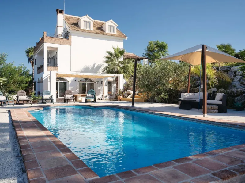 Welcome to this villa in the Alhaurín countryside offering 4 bedrooms, 4 bathrooms, over 5,000 m² plot  and a private pool!