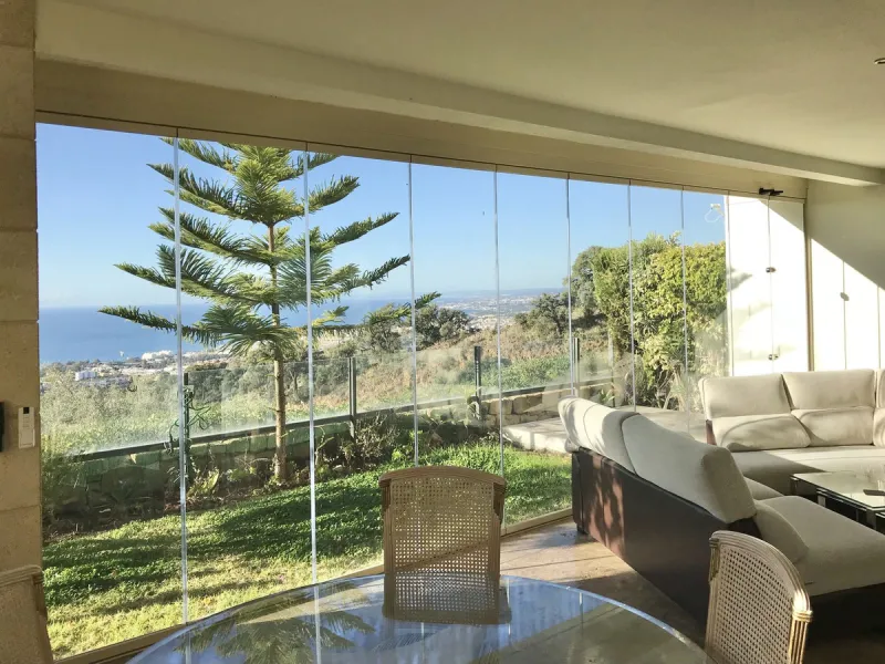 Nested in a natural and peaceful environment, surrounded by oak and pine trees, in an prestigious contemporary complex with 24 concierge and security service, this large 2 bedroom corner apartment offers some of the best views of the Mediterranean in Marb