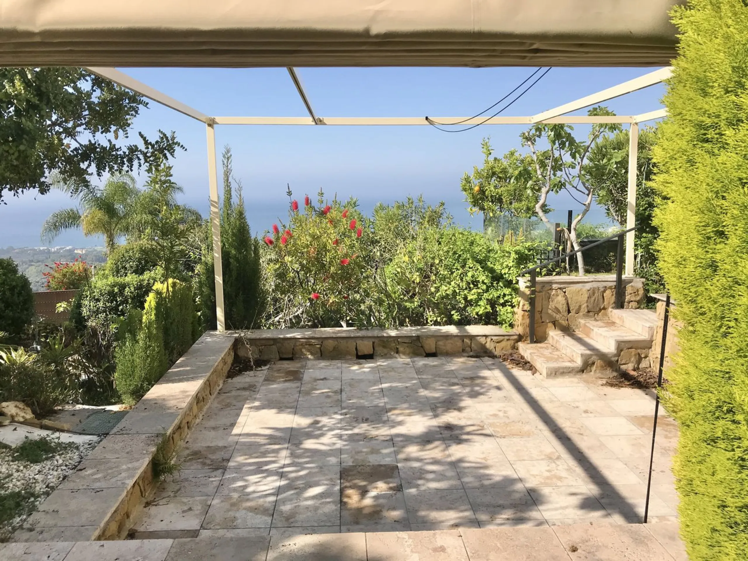 Nested in a natural and peaceful environment, surrounded by oak and pine trees, in an prestigious contemporary complex with 24 concierge and security service, this large 2 bedroom corner apartment offers some of the best views of the Mediterranean in Marb