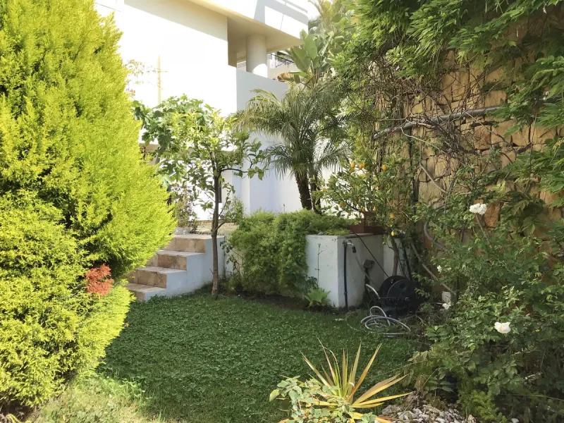 Nested in a natural and peaceful environment, surrounded by oak and pine trees, in an prestigious contemporary complex with 24 concierge and security service, this large 2 bedroom corner apartment offers some of the best views of the Mediterranean in Marb
