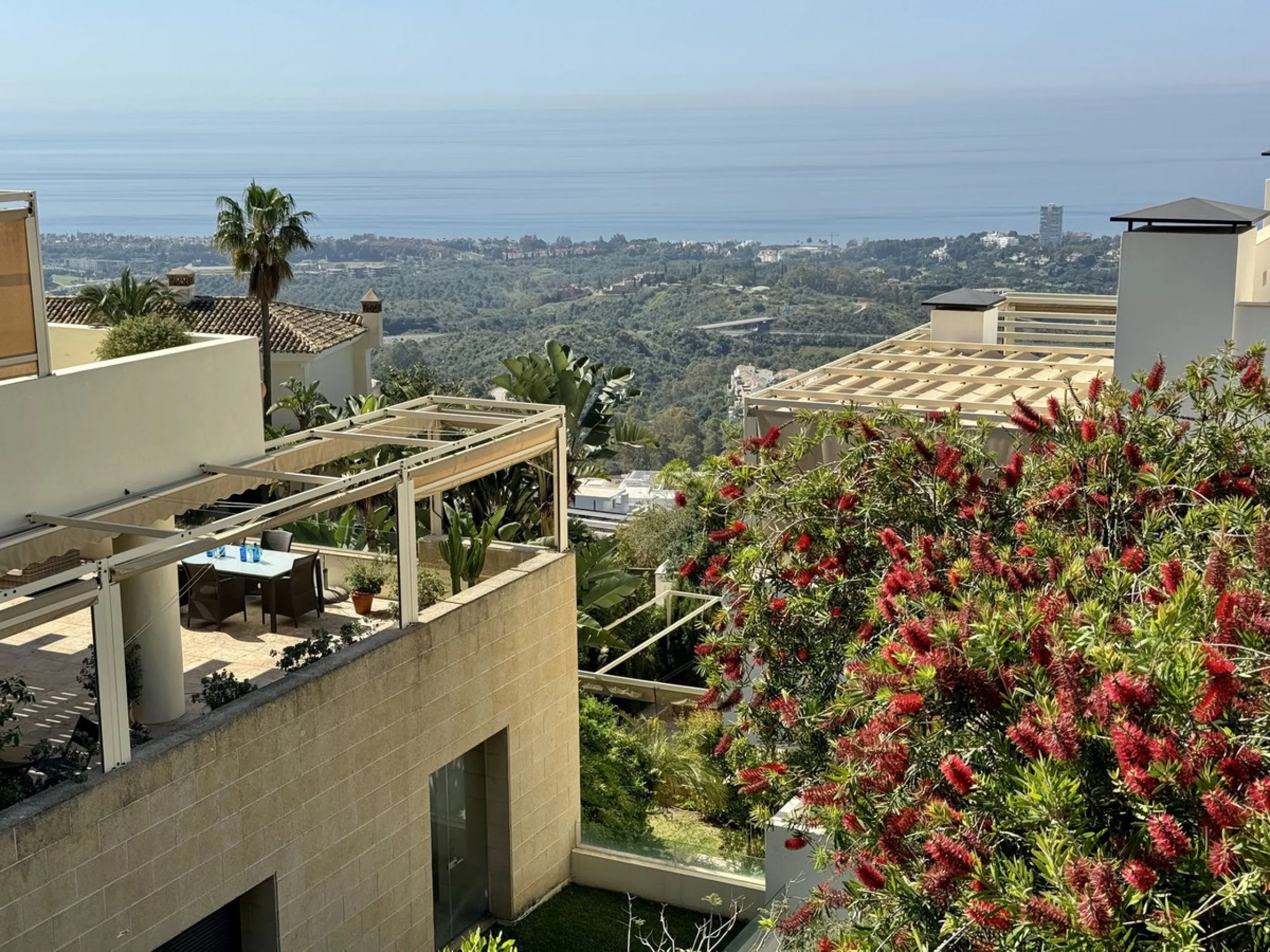 Nested in a natural and peaceful environment, surrounded by oak and pine trees, in an prestigious contemporary complex with 24 concierge and security service, this large 2 bedroom corner apartment offers some of the best views of the Mediterranean in Marb