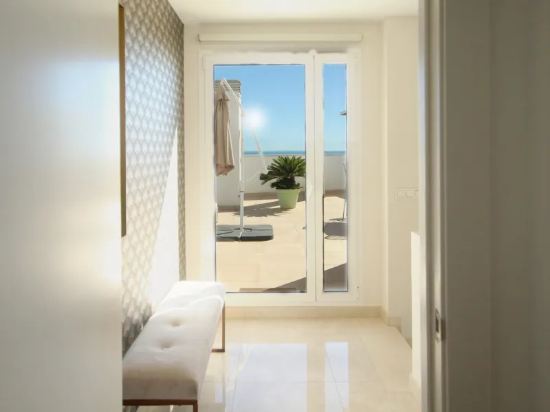 STUNNING Penthouse with panoramic, unobstructed views in the beautiful, newly built Elements gated complex in Altos de Marbella, just an 8-minute drive from alluring beaches and the Marbella arch. This glamorous southwest-oriented home boasts magnificent 