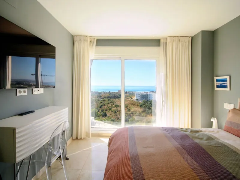 STUNNING Penthouse with panoramic, unobstructed views in the beautiful, newly built Elements gated complex in Altos de Marbella, just an 8-minute drive from alluring beaches and the Marbella arch. This glamorous southwest-oriented home boasts magnificent 