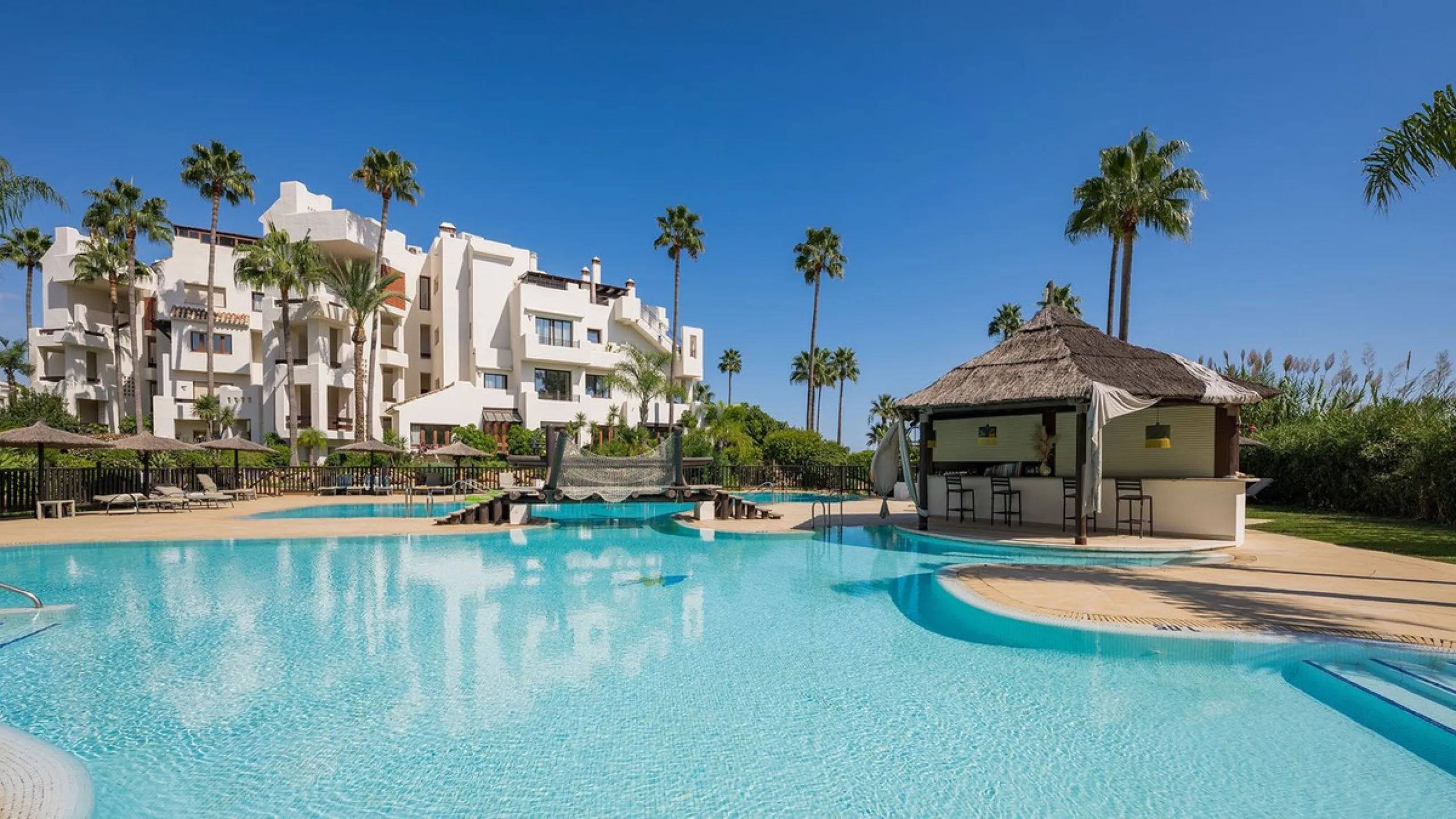 This exceptional ground-floor apartment combines luxury, comfort, and tranquility in perfect harmony. Featuring three spacious bedrooms and two bathrooms across 126 sqm of thoughtfully designed living space, the home offers an open-plan layout that unites