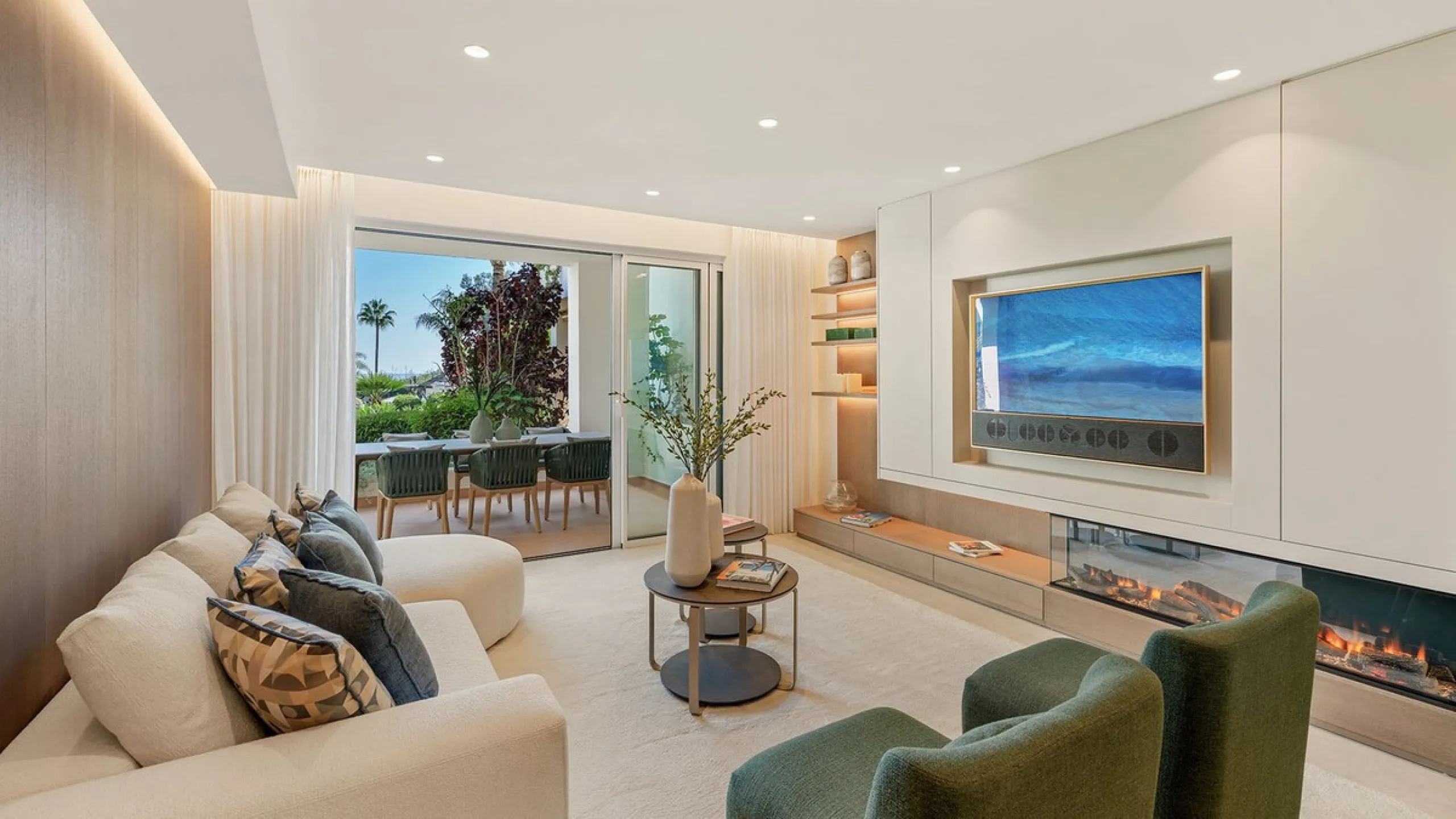 This exceptional ground-floor apartment combines luxury, comfort, and tranquility in perfect harmony. Featuring three spacious bedrooms and two bathrooms across 126 sqm of thoughtfully designed living space, the home offers an open-plan layout that unites