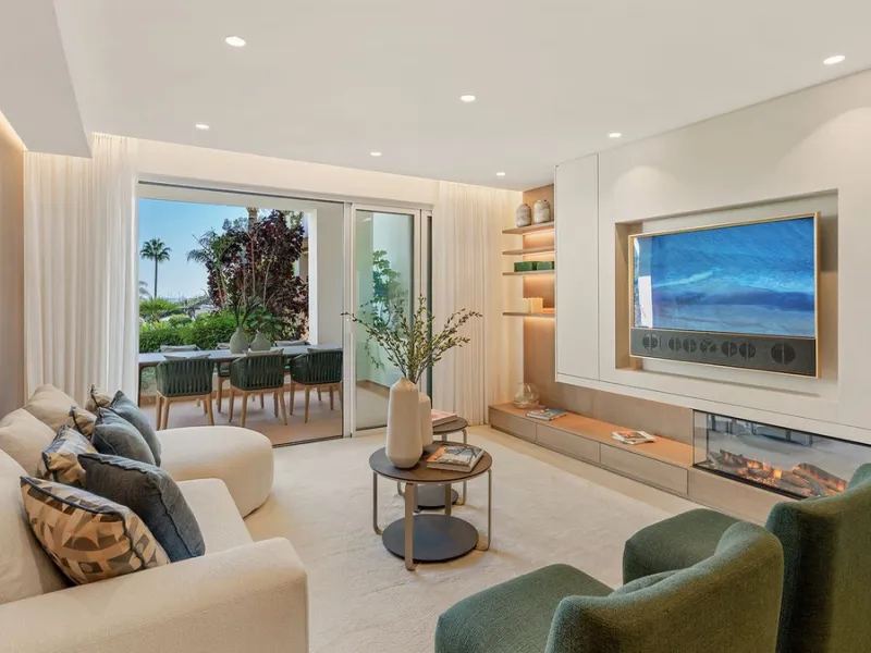 This exceptional ground-floor apartment combines luxury, comfort, and tranquility in perfect harmony. Featuring three spacious bedrooms and two bathrooms across 126 sqm of thoughtfully designed living space, the home offers an open-plan layout that unites