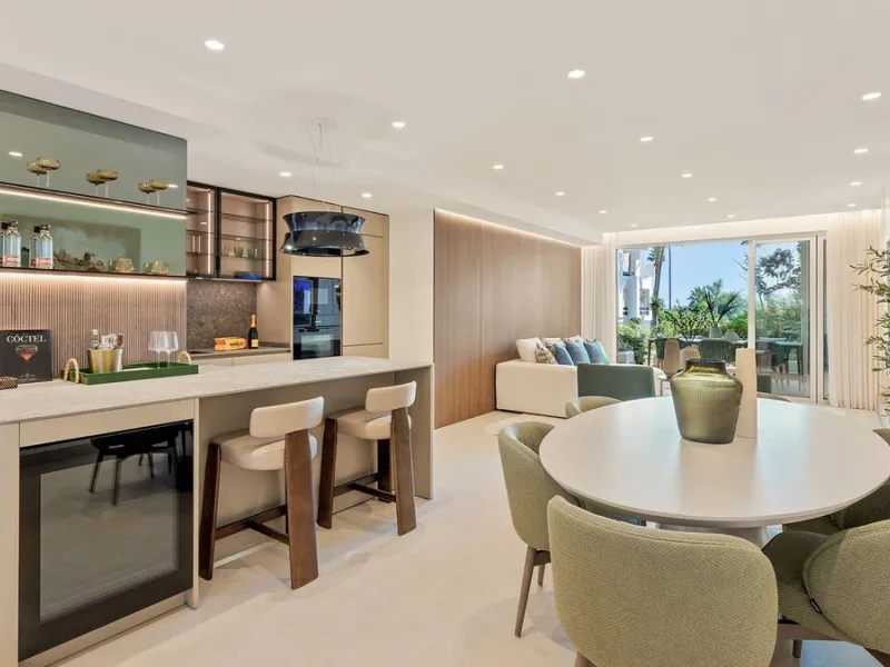 This exceptional ground-floor apartment combines luxury, comfort, and tranquility in perfect harmony. Featuring three spacious bedrooms and two bathrooms across 126 sqm of thoughtfully designed living space, the home offers an open-plan layout that unites