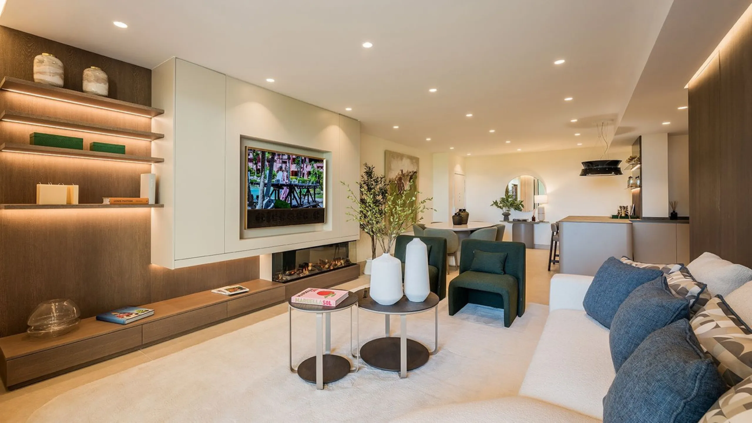 This exceptional ground-floor apartment combines luxury, comfort, and tranquility in perfect harmony. Featuring three spacious bedrooms and two bathrooms across 126 sqm of thoughtfully designed living space, the home offers an open-plan layout that unites