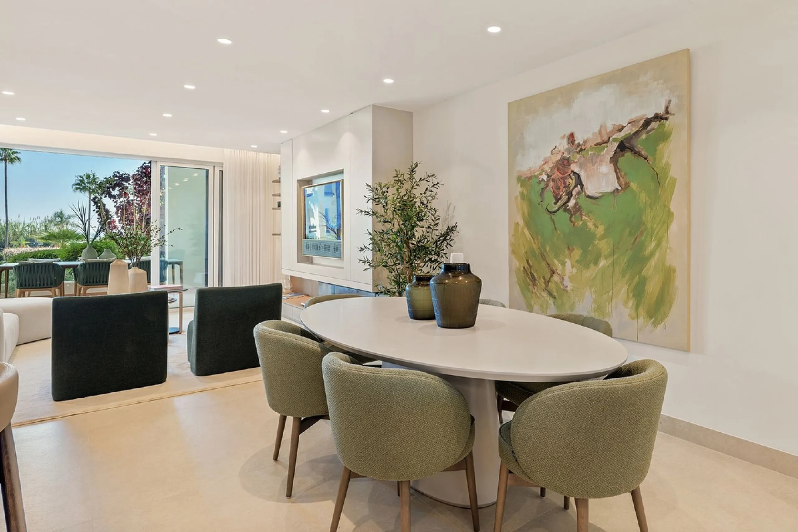 This exceptional ground-floor apartment combines luxury, comfort, and tranquility in perfect harmony. Featuring three spacious bedrooms and two bathrooms across 126 sqm of thoughtfully designed living space, the home offers an open-plan layout that unites