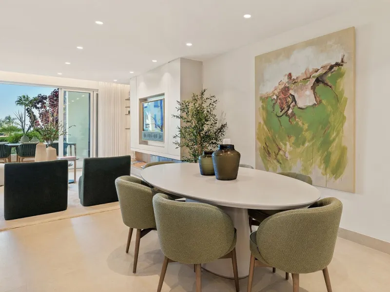 This exceptional ground-floor apartment combines luxury, comfort, and tranquility in perfect harmony. Featuring three spacious bedrooms and two bathrooms across 126 sqm of thoughtfully designed living space, the home offers an open-plan layout that unites