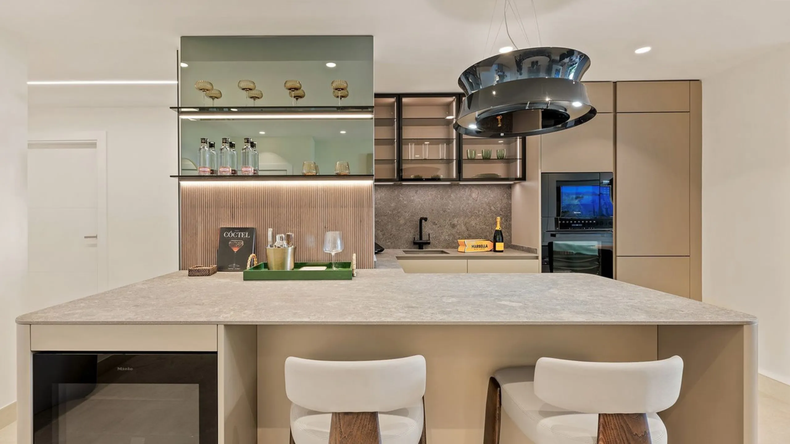 This exceptional ground-floor apartment combines luxury, comfort, and tranquility in perfect harmony. Featuring three spacious bedrooms and two bathrooms across 126 sqm of thoughtfully designed living space, the home offers an open-plan layout that unites