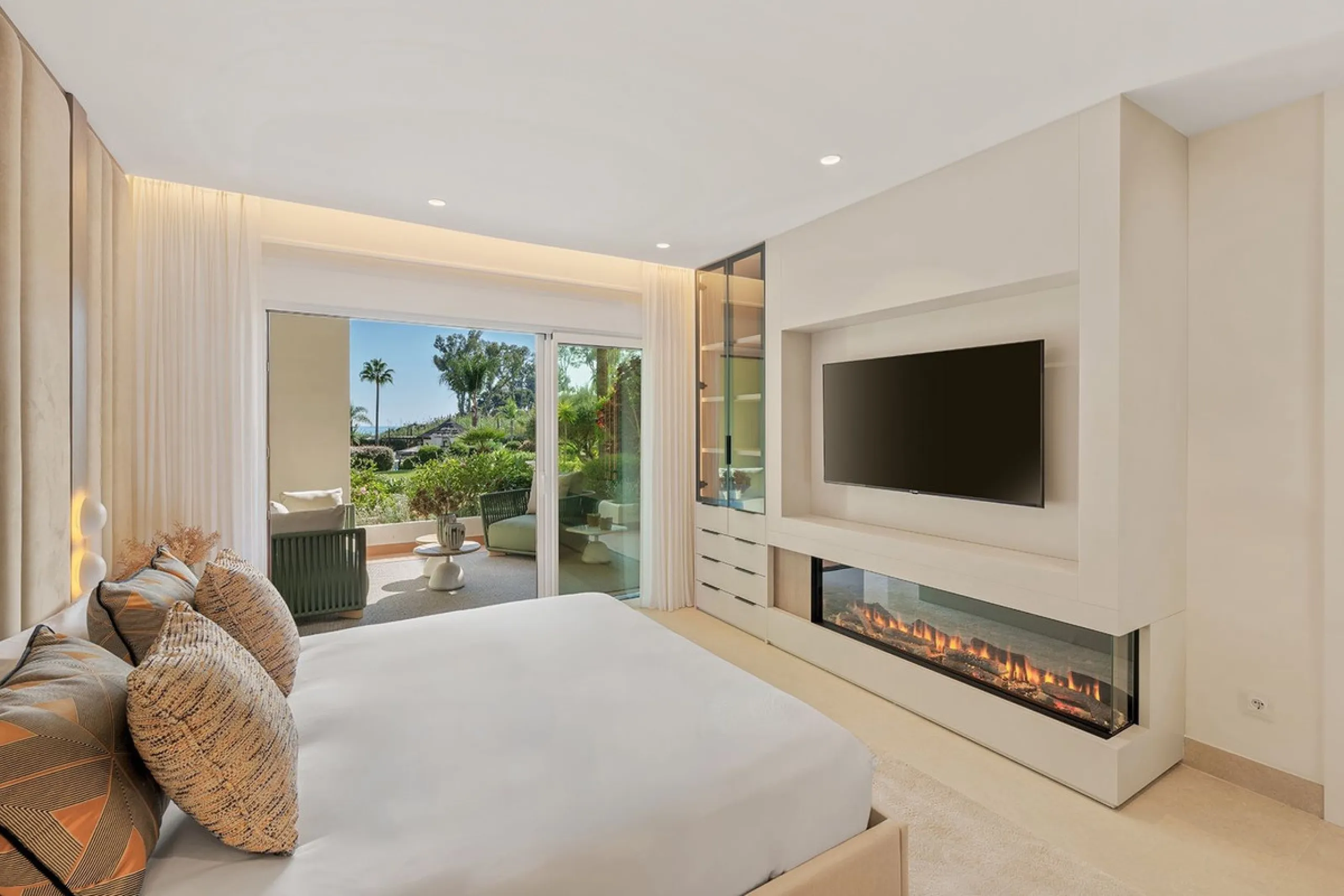 This exceptional ground-floor apartment combines luxury, comfort, and tranquility in perfect harmony. Featuring three spacious bedrooms and two bathrooms across 126 sqm of thoughtfully designed living space, the home offers an open-plan layout that unites