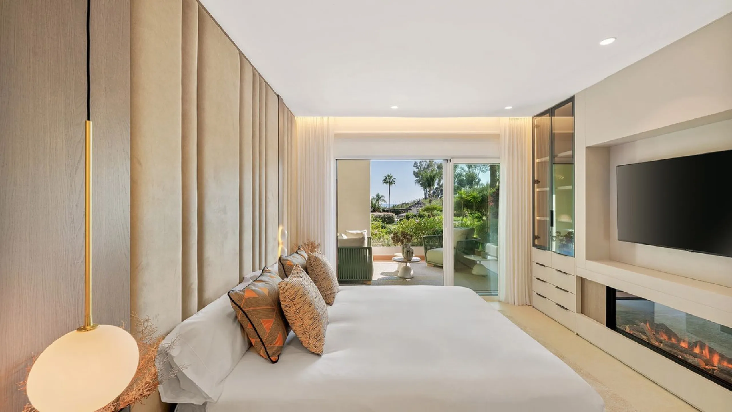This exceptional ground-floor apartment combines luxury, comfort, and tranquility in perfect harmony. Featuring three spacious bedrooms and two bathrooms across 126 sqm of thoughtfully designed living space, the home offers an open-plan layout that unites