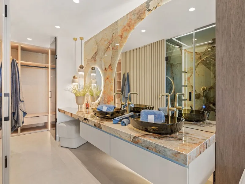 This exceptional ground-floor apartment combines luxury, comfort, and tranquility in perfect harmony. Featuring three spacious bedrooms and two bathrooms across 126 sqm of thoughtfully designed living space, the home offers an open-plan layout that unites