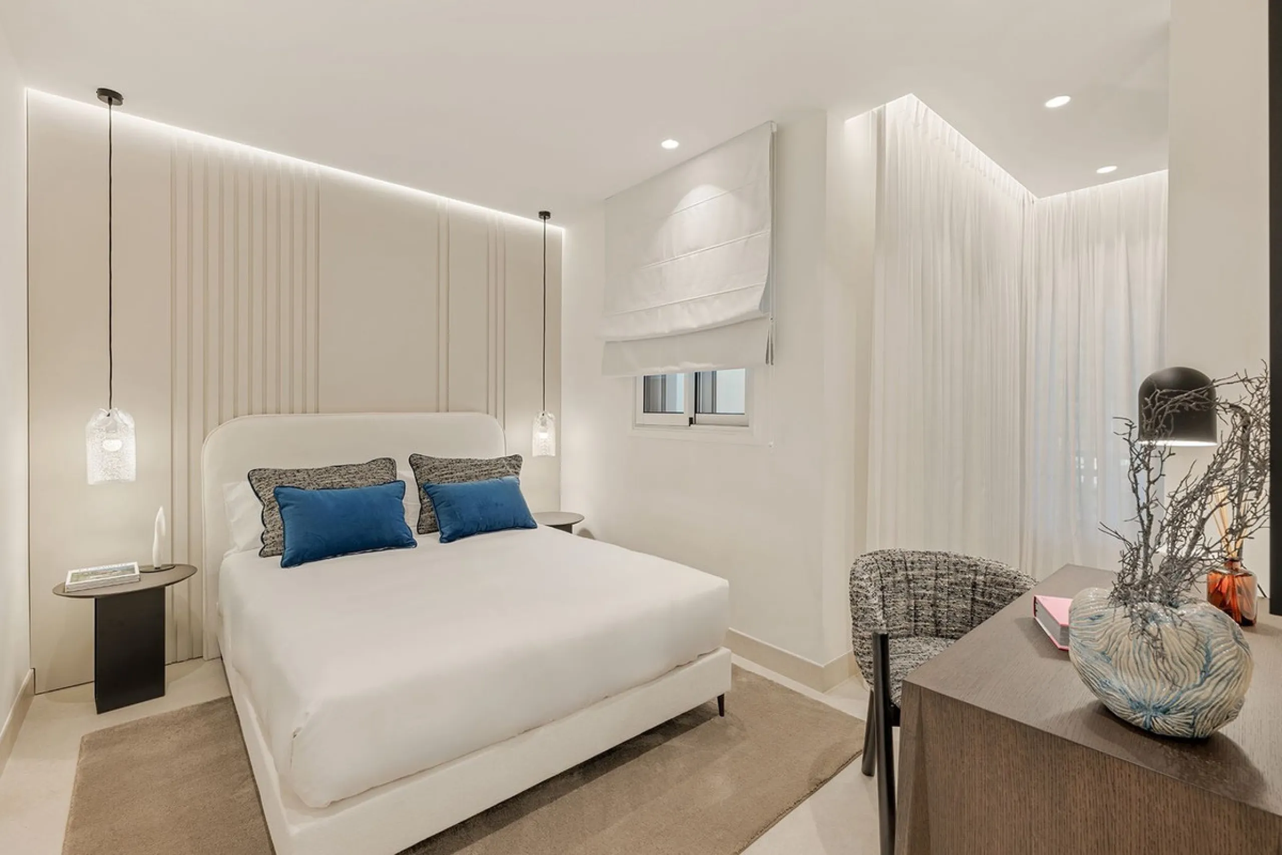 This exceptional ground-floor apartment combines luxury, comfort, and tranquility in perfect harmony. Featuring three spacious bedrooms and two bathrooms across 126 sqm of thoughtfully designed living space, the home offers an open-plan layout that unites