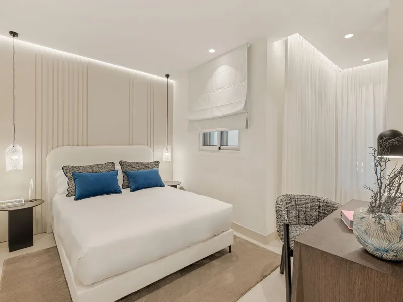 This exceptional ground-floor apartment combines luxury, comfort, and tranquility in perfect harmony. Featuring three spacious bedrooms and two bathrooms across 126 sqm of thoughtfully designed living space, the home offers an open-plan layout that unites