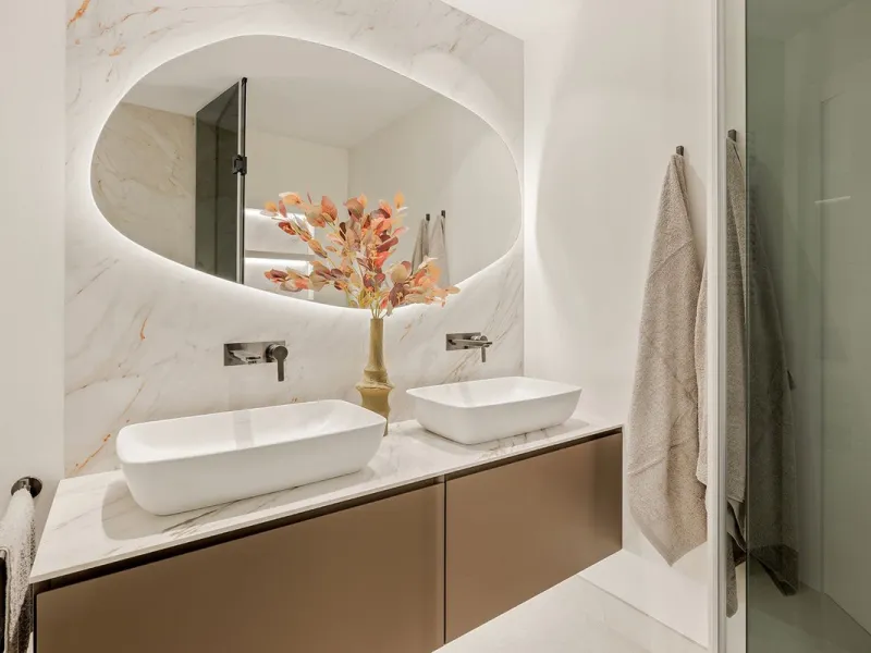 This exceptional ground-floor apartment combines luxury, comfort, and tranquility in perfect harmony. Featuring three spacious bedrooms and two bathrooms across 126 sqm of thoughtfully designed living space, the home offers an open-plan layout that unites