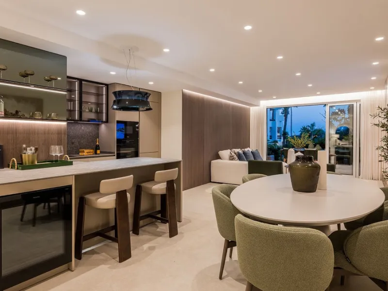 This exceptional ground-floor apartment combines luxury, comfort, and tranquility in perfect harmony. Featuring three spacious bedrooms and two bathrooms across 126 sqm of thoughtfully designed living space, the home offers an open-plan layout that unites