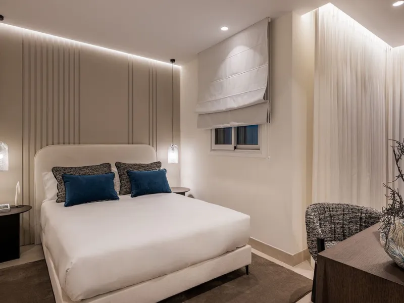 This exceptional ground-floor apartment combines luxury, comfort, and tranquility in perfect harmony. Featuring three spacious bedrooms and two bathrooms across 126 sqm of thoughtfully designed living space, the home offers an open-plan layout that unites