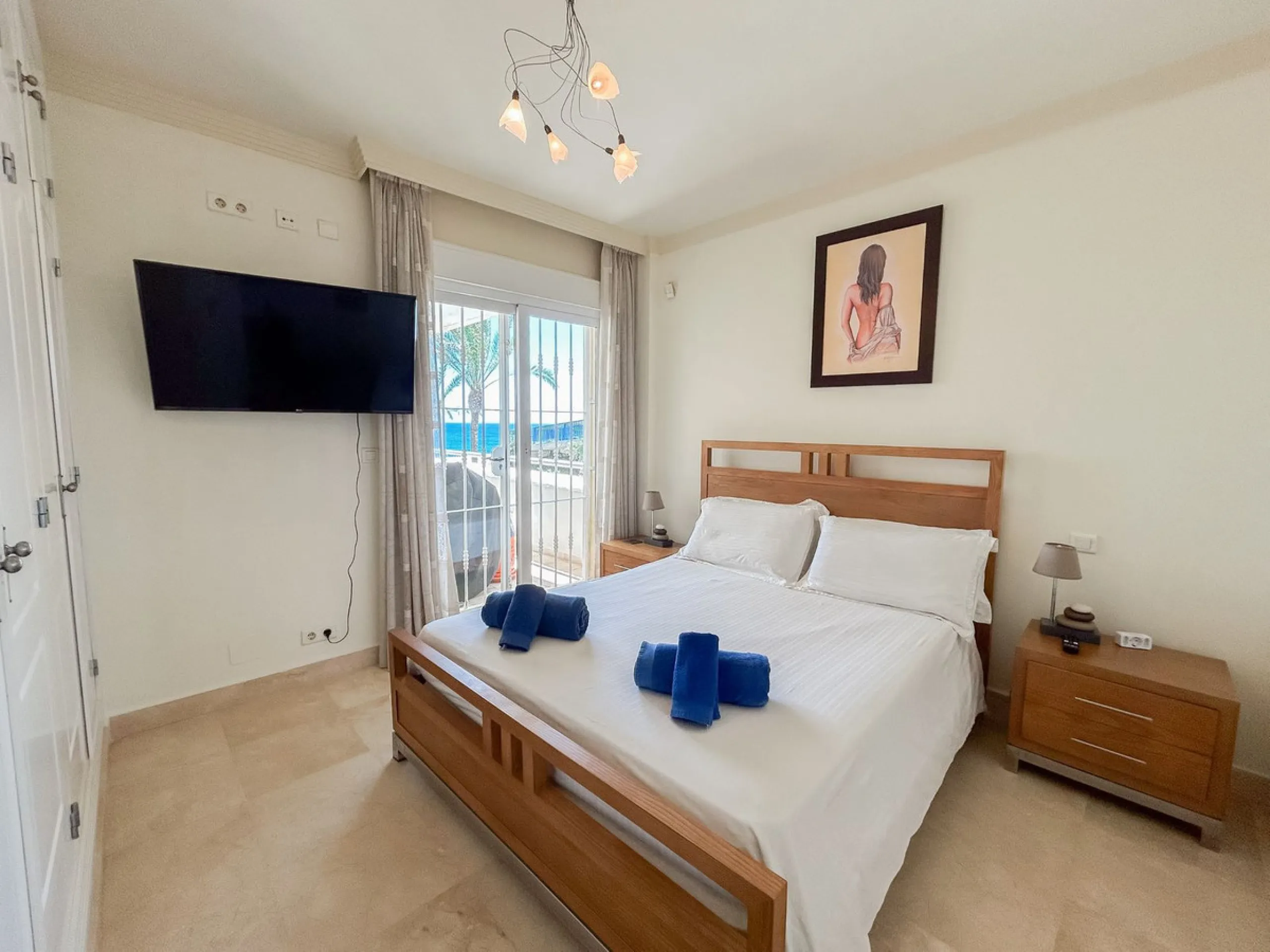 Unique beachfront opportunity located in the sought-after area of Buenas Noches, Estepona, this frontline beach apartment offers direct access to the Mediterranean and uninterrupted panoramic sea views. The property features two spacious bedrooms and two 