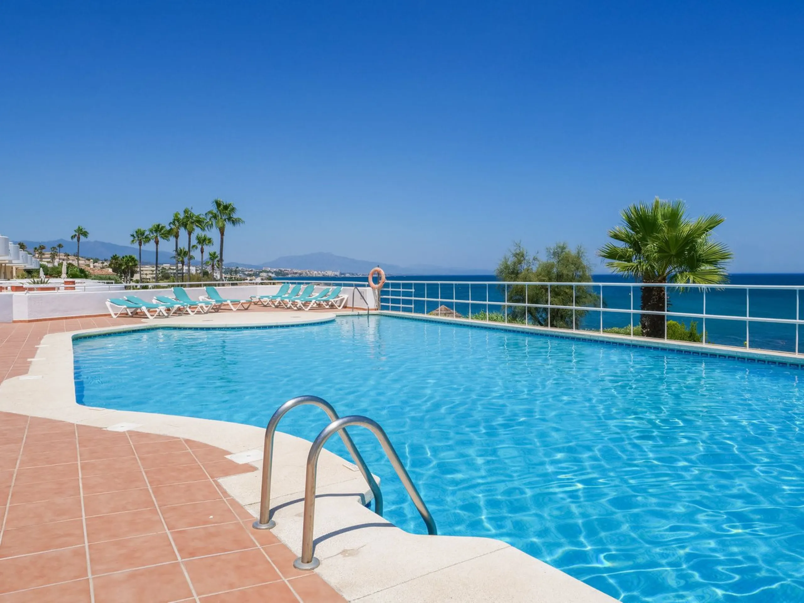Unique beachfront opportunity located in the sought-after area of Buenas Noches, Estepona, this frontline beach apartment offers direct access to the Mediterranean and uninterrupted panoramic sea views. The property features two spacious bedrooms and two 
