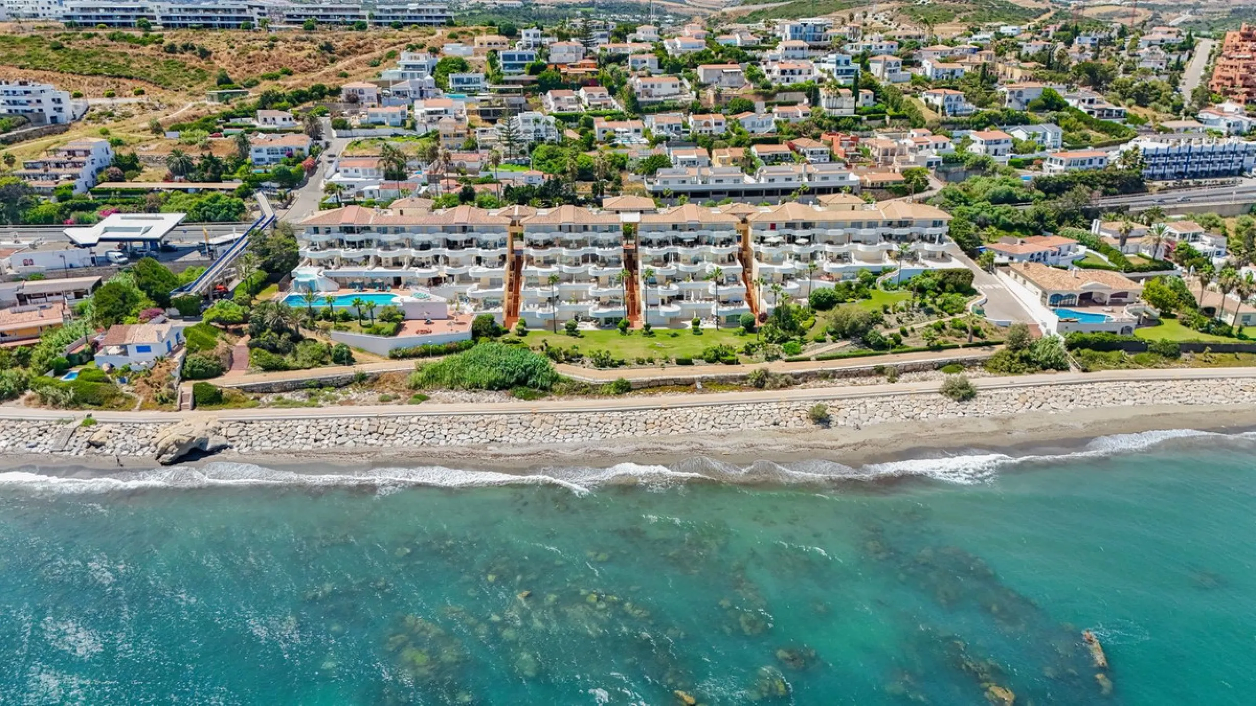 Unique beachfront opportunity located in the sought-after area of Buenas Noches, Estepona, this frontline beach apartment offers direct access to the Mediterranean and uninterrupted panoramic sea views. The property features two spacious bedrooms and two 