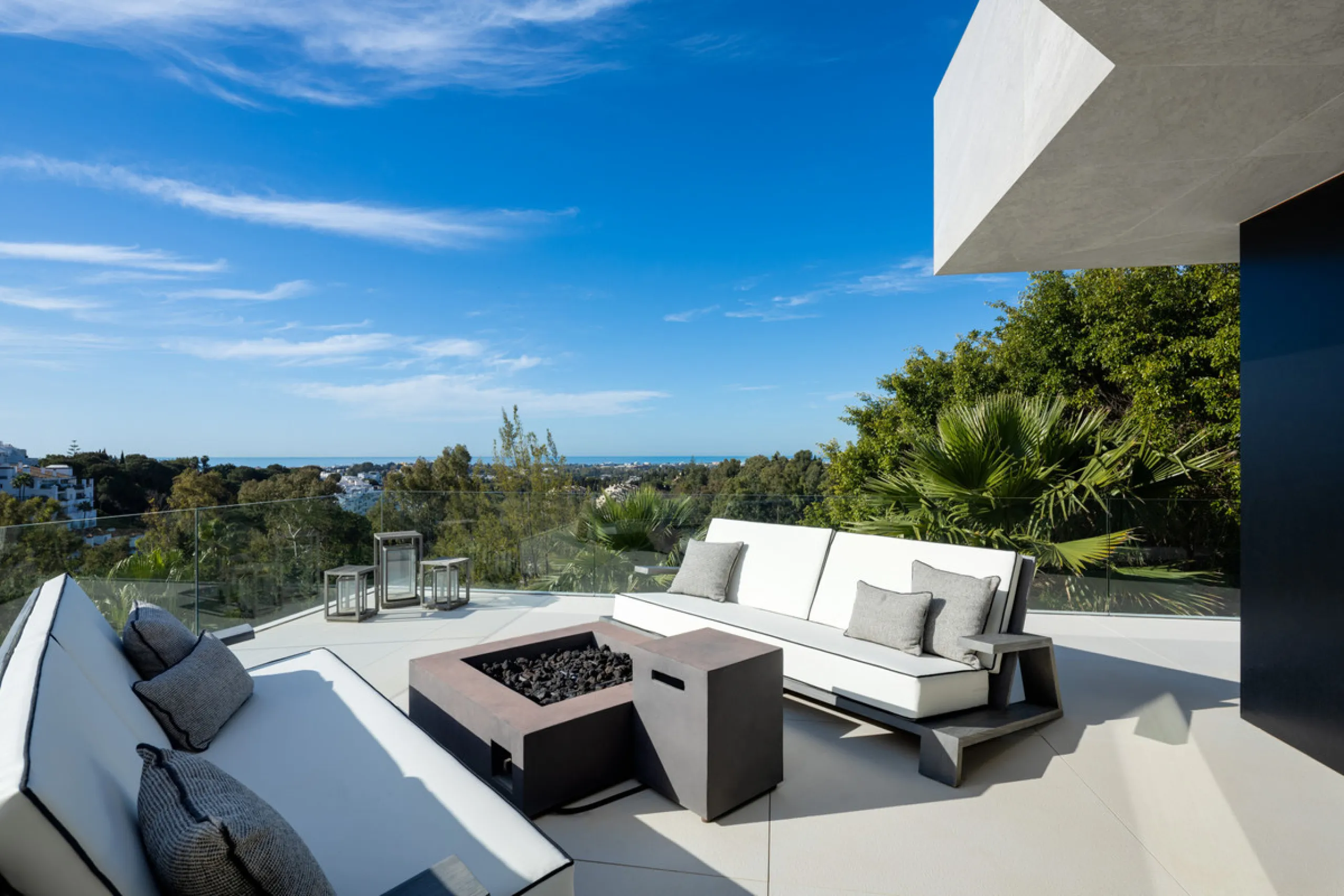 This is a contemporary 5-bedroom luxury villa for sale in the prestigious La Quinta Golf Resort, Benahavís, offering panoramic views and exceptional modern living in one of the Costa del Sol's most desirable gated communities.