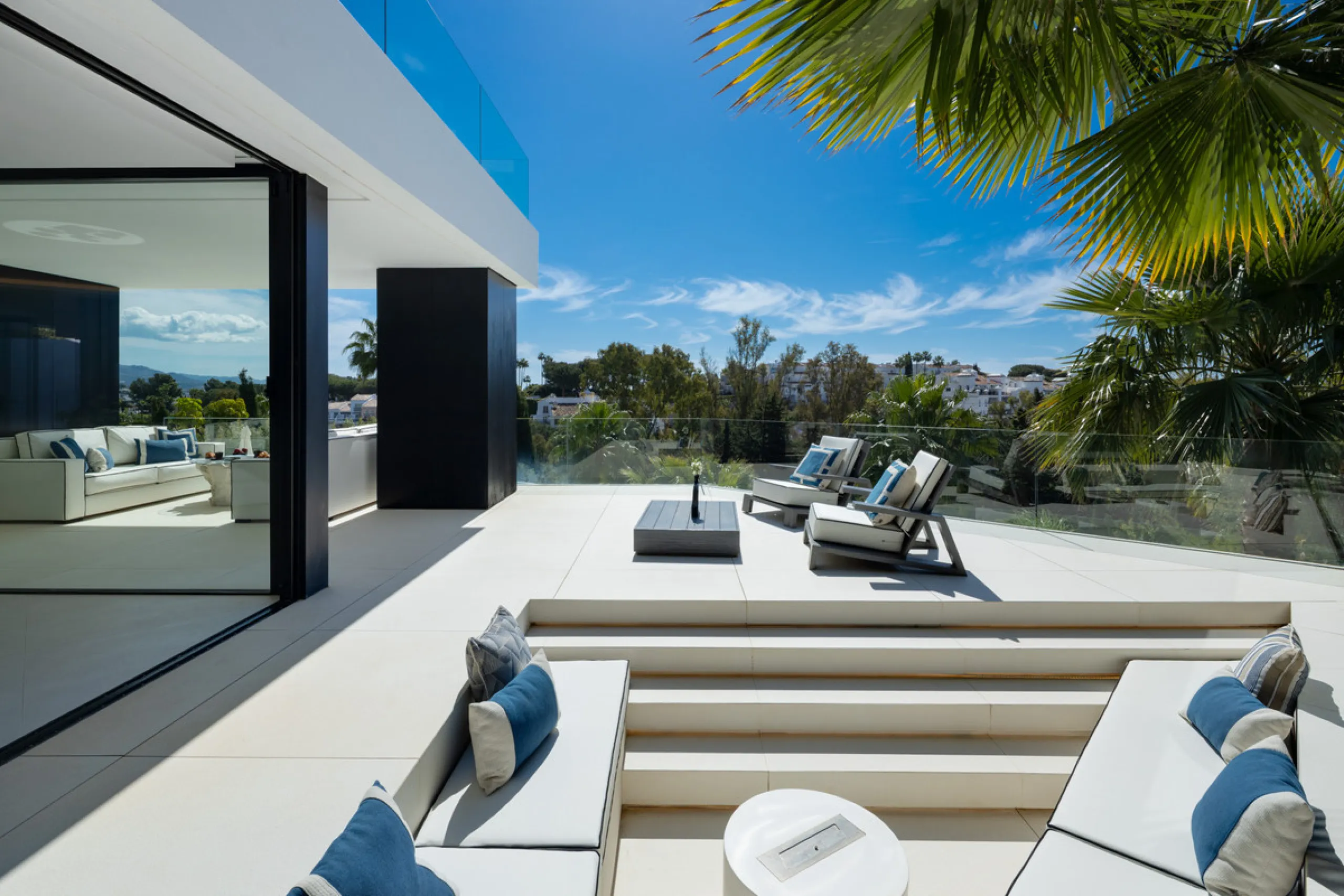 This is a contemporary 5-bedroom luxury villa for sale in the prestigious La Quinta Golf Resort, Benahavís, offering panoramic views and exceptional modern living in one of the Costa del Sol's most desirable gated communities.