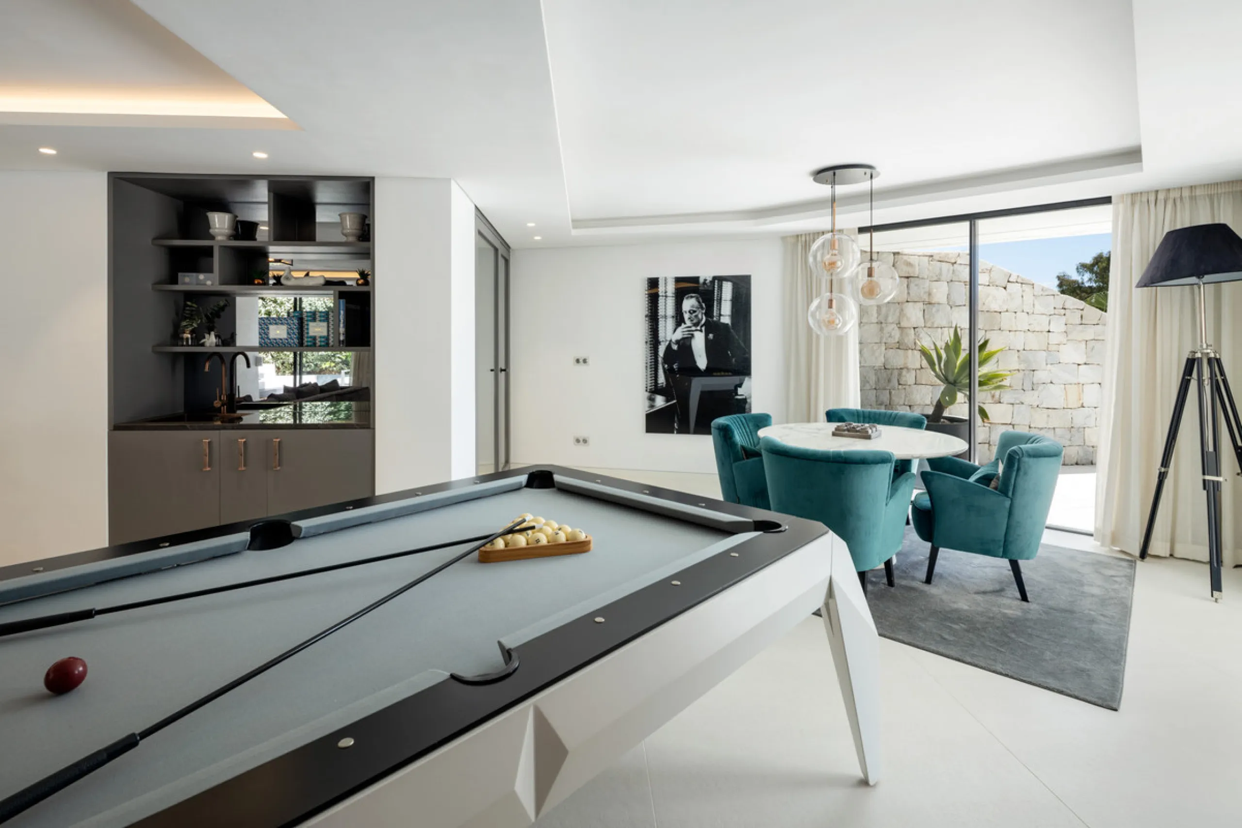 This is a contemporary 5-bedroom luxury villa for sale in the prestigious La Quinta Golf Resort, Benahavís, offering panoramic views and exceptional modern living in one of the Costa del Sol's most desirable gated communities.