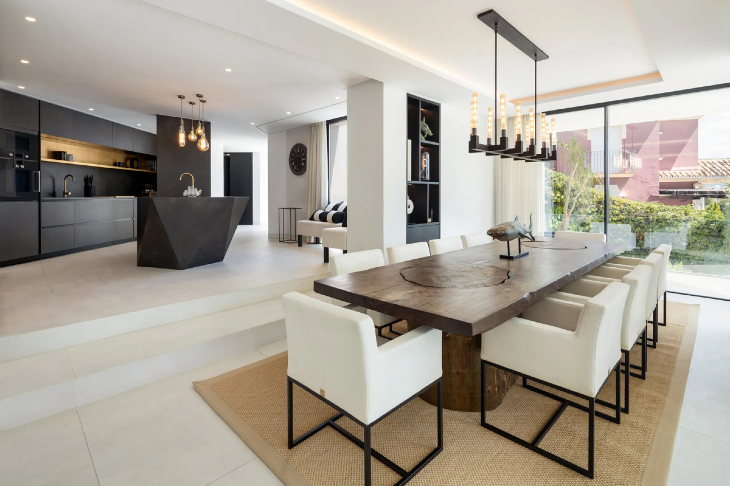 This is a contemporary 5-bedroom luxury villa for sale in the prestigious La Quinta Golf Resort, Benahavís, offering panoramic views and exceptional modern living in one of the Costa del Sol's most desirable gated communities.