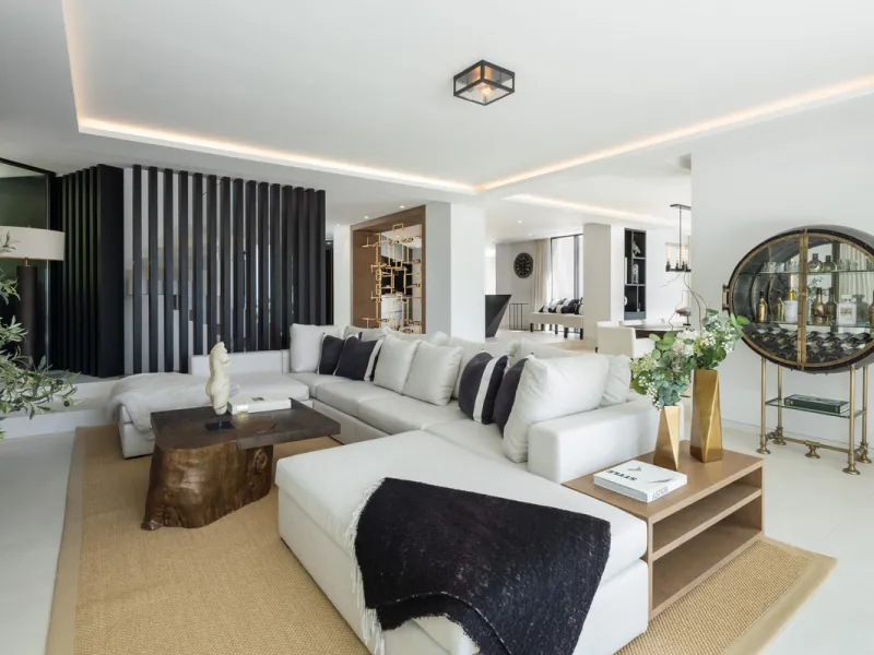 This is a contemporary 5-bedroom luxury villa for sale in the prestigious La Quinta Golf Resort, Benahavís, offering panoramic views and exceptional modern living in one of the Costa del Sol's most desirable gated communities.