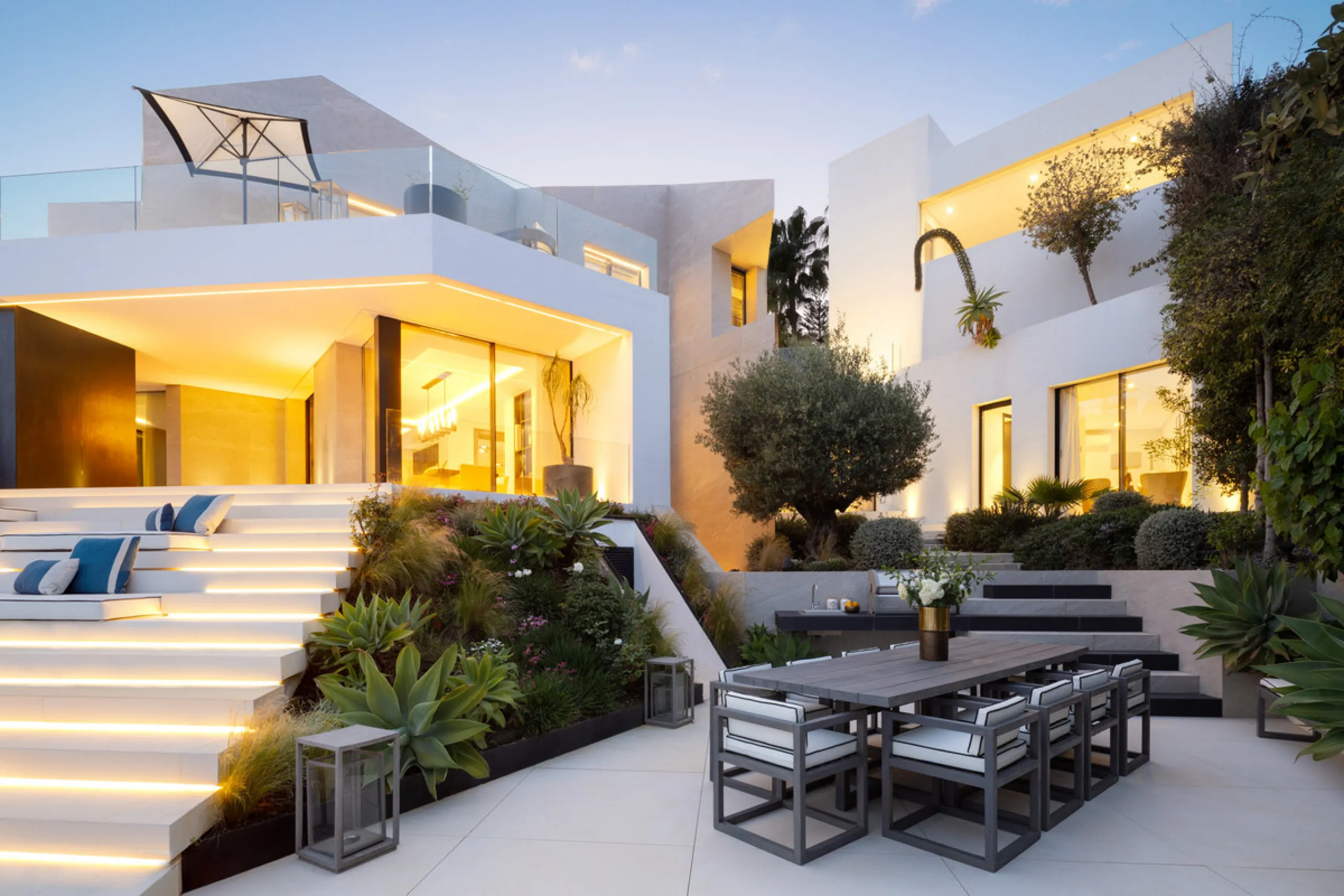 This is a contemporary 5-bedroom luxury villa for sale in the prestigious La Quinta Golf Resort, Benahavís, offering panoramic views and exceptional modern living in one of the Costa del Sol's most desirable gated communities.
