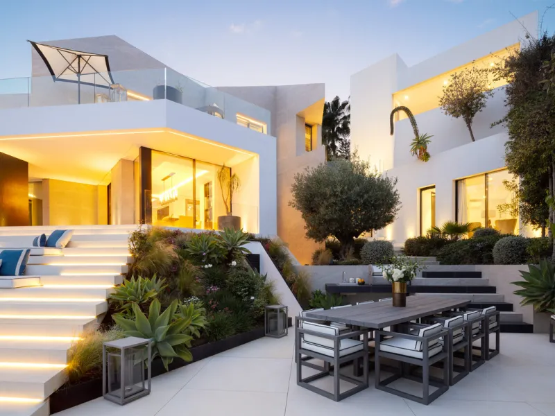This is a contemporary 5-bedroom luxury villa for sale in the prestigious La Quinta Golf Resort, Benahavís, offering panoramic views and exceptional modern living in one of the Costa del Sol's most desirable gated communities.