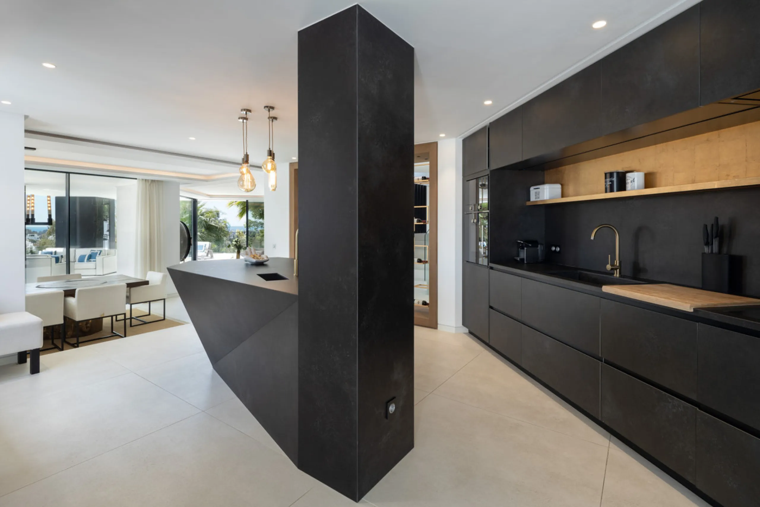 This is a contemporary 5-bedroom luxury villa for sale in the prestigious La Quinta Golf Resort, Benahavís, offering panoramic views and exceptional modern living in one of the Costa del Sol's most desirable gated communities.