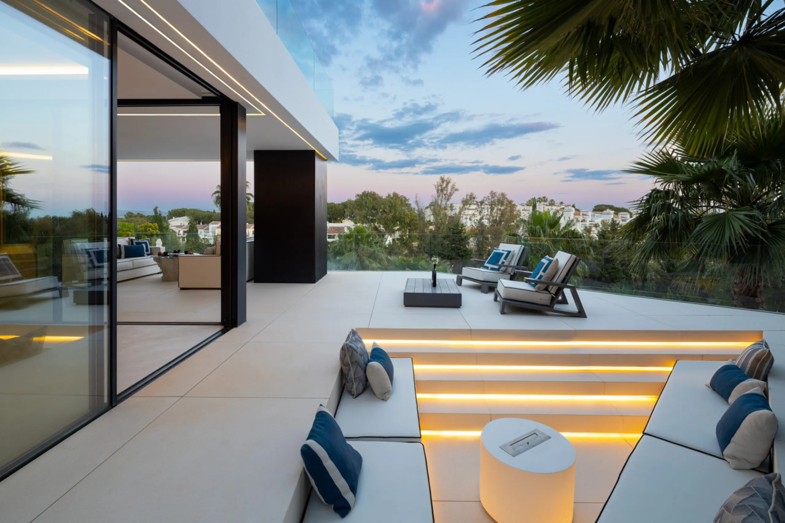 This is a contemporary 5-bedroom luxury villa for sale in the prestigious La Quinta Golf Resort, Benahavís, offering panoramic views and exceptional modern living in one of the Costa del Sol's most desirable gated communities.