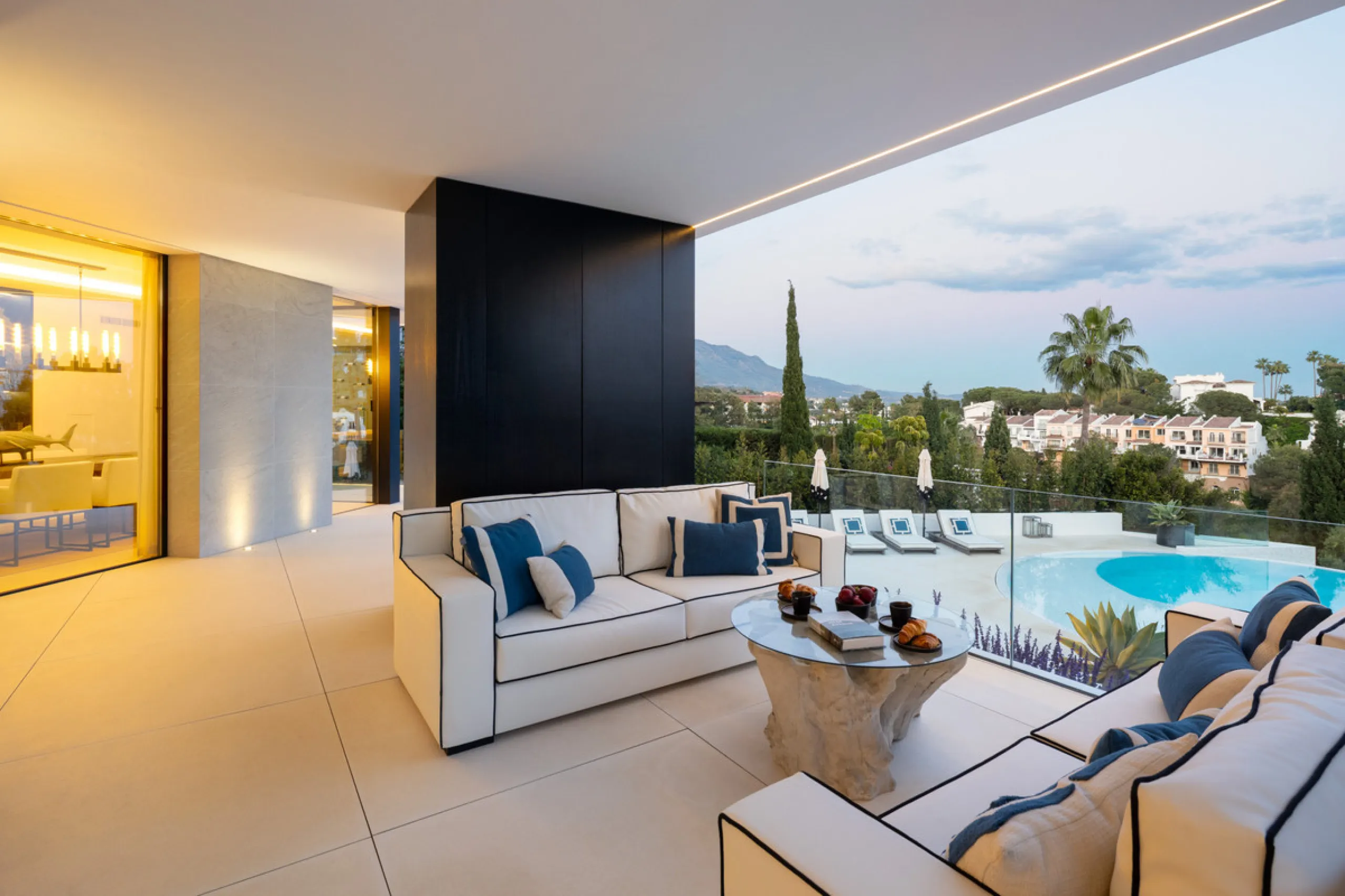 This is a contemporary 5-bedroom luxury villa for sale in the prestigious La Quinta Golf Resort, Benahavís, offering panoramic views and exceptional modern living in one of the Costa del Sol's most desirable gated communities.