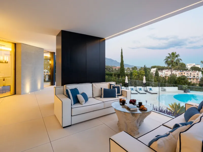 This is a contemporary 5-bedroom luxury villa for sale in the prestigious La Quinta Golf Resort, Benahavís, offering panoramic views and exceptional modern living in one of the Costa del Sol's most desirable gated communities.