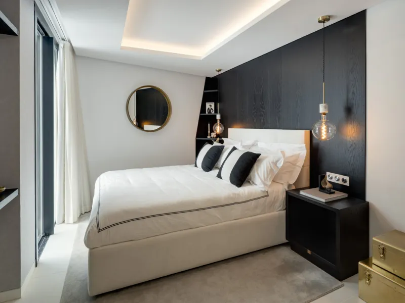 This is a contemporary 5-bedroom luxury villa for sale in the prestigious La Quinta Golf Resort, Benahavís, offering panoramic views and exceptional modern living in one of the Costa del Sol's most desirable gated communities.