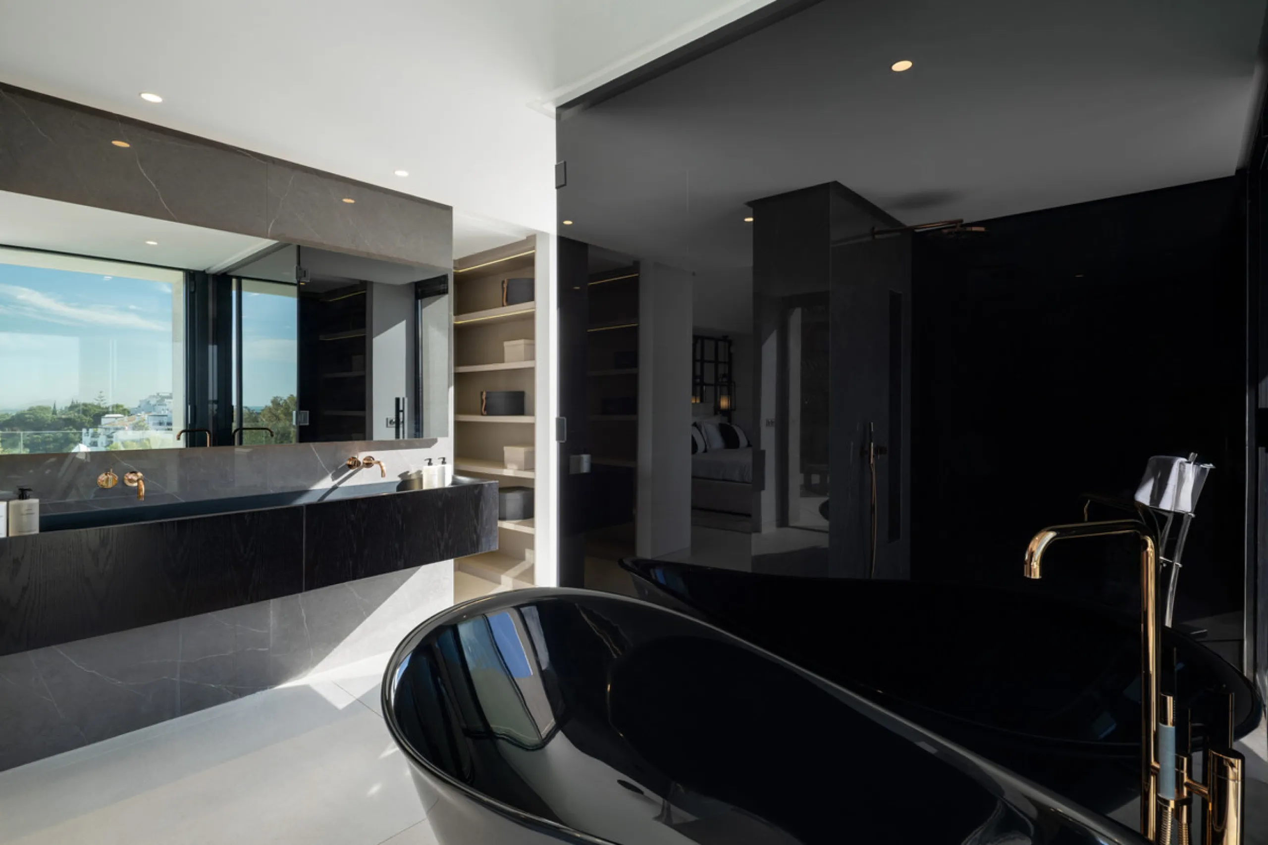 This is a contemporary 5-bedroom luxury villa for sale in the prestigious La Quinta Golf Resort, Benahavís, offering panoramic views and exceptional modern living in one of the Costa del Sol's most desirable gated communities.